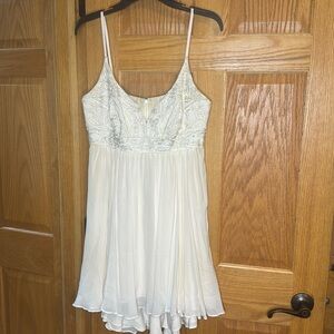 Nicole Miller fully lined Silk Dress with Beaded embellishments, Size 12